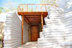 To maximize space, an outdoor terrace/ deck is built on the upper level between the EarthBlock Vault House and the Emergency Shelter Dome.