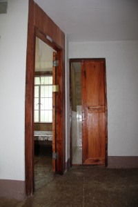 Bedroom (left), Bathroom (forward).  To maximize space, a sliding door was installed for the bathroom.